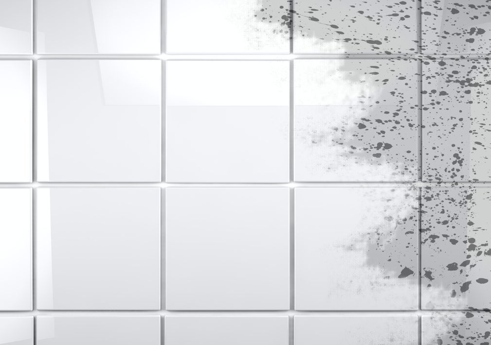 dirty floor with clean section of tiles