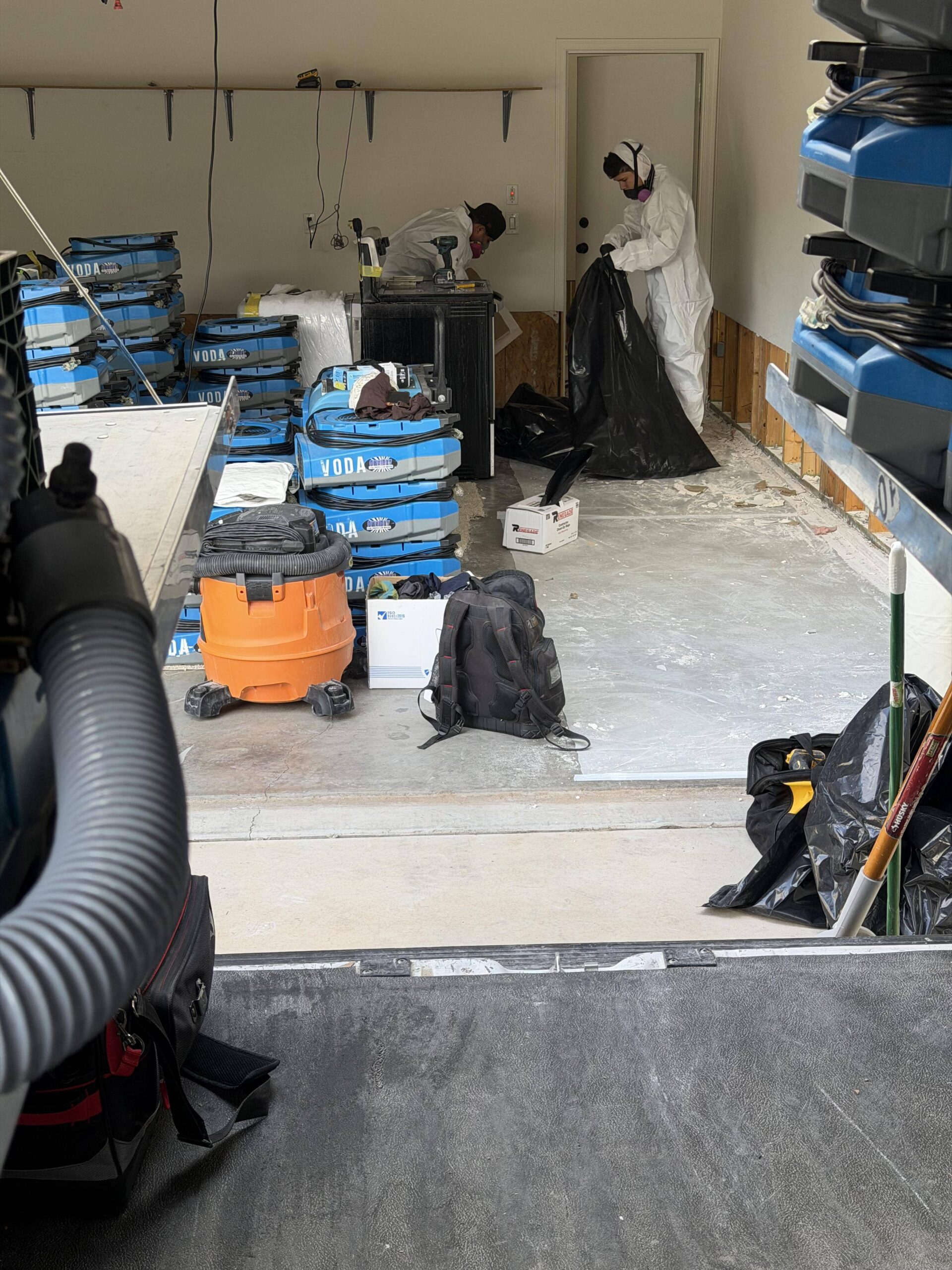 Professional water damage drying equipment operating on the job in Maricopa home